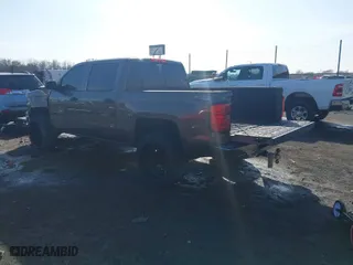 2014 Chevrolet Silverado 1500 LT with VIN 3GCUKRECXEG281990, listed as a IAAI auction lot 41535853 with 142,702 mi miles. Bid and sale history available at carsss.com. Image 3.