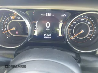 2020 Jeep Wrangler Unlimited Sport S z VIN 1C4HJXDN2LW261730, wystawiony jako IAAI lot #42034942 z przebiegiem 61 465 mil mil oraz . Historia ofert i sprzedaży dostępna na DreamBid. Obrazek 7.