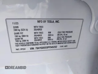 2023 Tesla Model Y Long Range with VIN 7SAYGDEE0PF945202, listed as a IAAI auction lot 41611762 with 7,316 mi miles and . Bid and sale history available at DreamBid. Image 9.