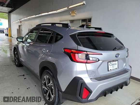 2024 Subaru Crosstrek Premium with VIN JF2GUADC0R8284615, listed as a IAAI auction lot 42621275 with 96 mi miles and . Bid and sale history available at DreamBid. Image 2.