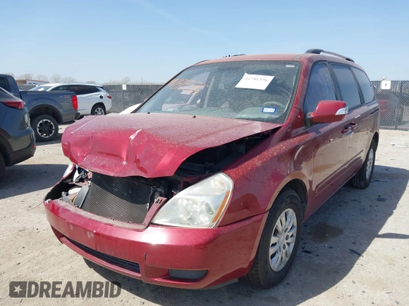 2012 Kia Sedona LX with VIN KNDMG4C70C6463190, listed as a IAAI auction lot 41781336 with 179,860 mi miles. Bid and sale history available at carsss.com. Image 17.