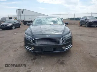 2017 Ford Fusion SE z VIN 3FA6P0H76HR354078, wystawiony jako IAAI lot #42103550 z przebiegiem 103 201 mil mil oraz . Historia ofert i sprzedaży dostępna na DreamBid. Obrazek 12.