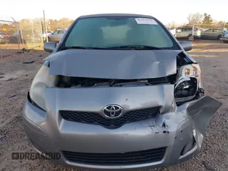 2009 Toyota Yaris with VIN JTDJT903495243871, listed as a IAAI auction lot 41753770 with 189,944 mi miles and . Bid and sale history available at DreamBid. Image 12.