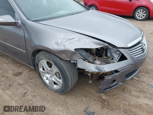 2006 Acura RL z VIN JH4KB16526C006190, wystawiony jako IAAI lot #42351400 z przebiegiem 150 749 mil mil oraz . Historia ofert i sprzedaży dostępna na DreamBid. Obrazek 6.