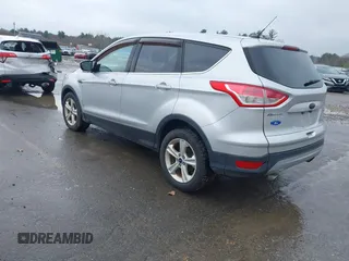 2015 Ford Escape SE with VIN 1FMCU9GX0FUB99881, listed as a IAAI auction lot 41919660 with 138,561 mi miles. Bid and sale history available at carsss.com. Image 3.