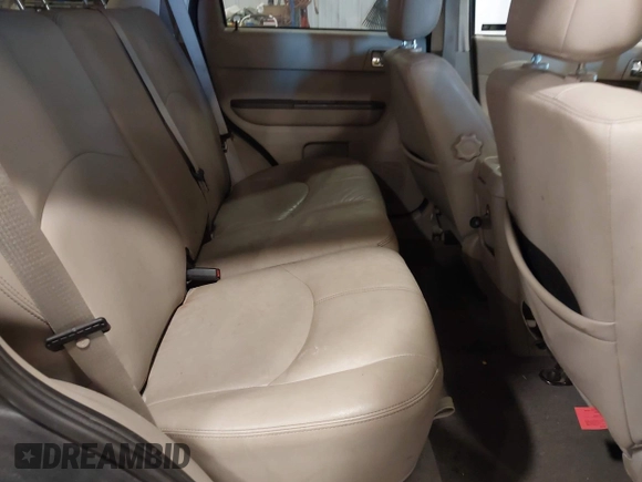 2008 Mercury Mariner Premier with VIN 4M2CU97168KJ20982, listed as a IAAI auction lot 41999498 with 151,524 mi miles and . Bid and sale history available at DreamBid. Image 8.