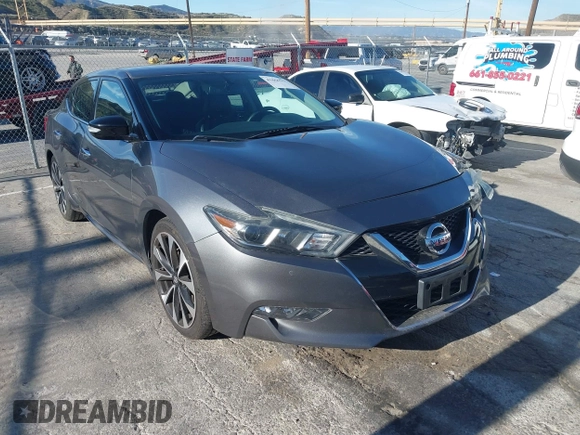 2018 Nissan Maxima Platinum z VIN 1N4AA6AP7JC392710, wystawiony jako IAAI lot #41866951 z przebiegiem 49 026 mil mil oraz . Historia ofert i sprzedaży dostępna na DreamBid. Obrazek 1.