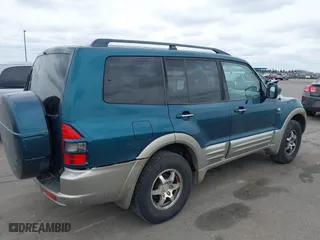 2002 Mitsubishi Montero LTD with VIN JA4MW51R82J003116, listed as a IAAI auction lot 41954991 with 223,784 mi miles. Bid and sale history available at carsss.com. Image 4.