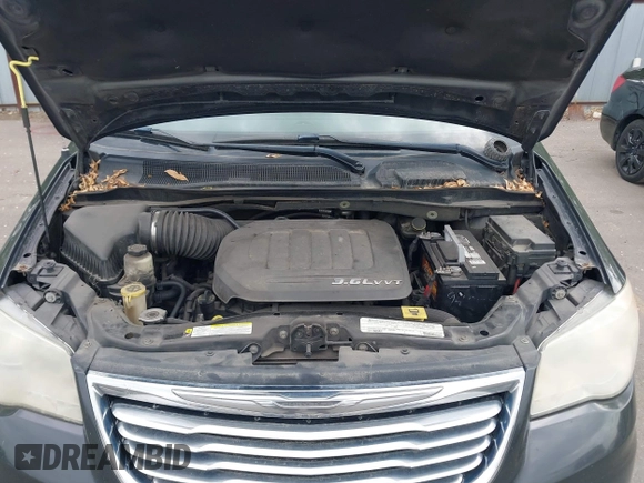 2012 Chrysler Town & Country Touring with VIN 2C4RC1BG1CR312532, listed as a IAAI auction lot 42194864 with 197,609 mi miles and . Bid and sale history available at DreamBid. Image 10.