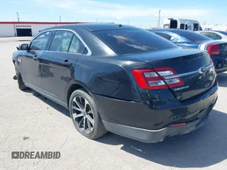 2014 Ford Taurus SEL with VIN 1FAHP2E8XEG133992, listed as a IAAI auction lot 42223678 with 201,204 mi miles and . Bid and sale history available at carsss.com. Image 3.