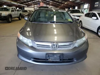 2012 Honda Civic LX z VIN 2HGFB2F59CH313357, wystawiony jako Copart lot #59526905 z przebiegiem 253 322 mil mil oraz Czysty tytuł • Clean title. Historia ofert i sprzedaży dostępna na DreamBid. Obrazek 5.