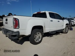 2016 GMC Canyon 2WD SLT with VIN 1GTG5DE17G1360721, listed as a Copart auction lot 73878564 with 0 mi miles and Salvage Title. Bid and sale history available at carsss.com. Image 3.