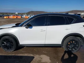 2021 Mazda CX-5 Grand Touring with VIN JM3KFBDM3M0417738, listed as a IAAI auction lot 41308123 with 90,134 mi miles. Bid and sale history available at carsss.com. Image 15.