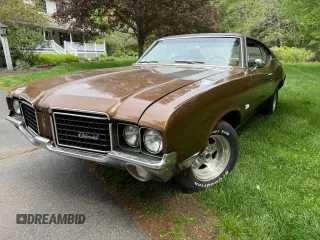 1972 Oldsmobile Cutlass z VIN 3F87H2G149401, wystawiony jako Copart lot #58824075 z przebiegiem 19 878 mil mil oraz Tytuł czysty. Historia ofert i sprzedaży dostępna na DreamBid. Obrazek 2.