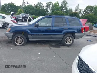 2002 Jeep Grand Cherokee Laredo with VIN 1J4GX48S02C125258, listed as a IAAI auction lot 42388724 with 295,270 mi miles and . Bid and sale history available at DreamBid. Image 14.