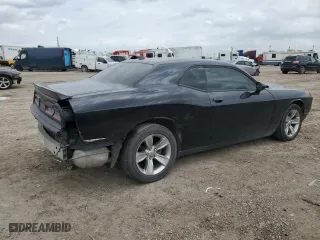 2021 Dodge Challenger SXT with VIN 2C3CDZAG1MH623487, listed as a Copart auction lot 48225645 with 77,086 mi miles and Salvage Title. Bid and sale history available at carsss.com. Image 3.