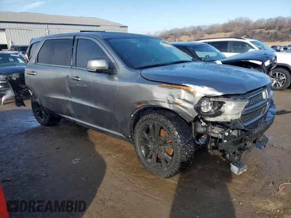 2012 Dodge Durango R/T with VIN 1C4SDHCT3CC188243, listed as a Copart auction lot 40917114 with 145,409 mi miles and Salvage title. Bid and sale history available at DreamBid. Image 4.