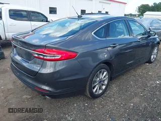 2017 Ford Fusion Hybrid SE z VIN 3FA6P0LU3HR260558, wystawiony jako IAAI lot #42657176 z przebiegiem 161 183 mil mil oraz . Historia ofert i sprzedaży dostępna na DreamBid. Obrazek 4.
