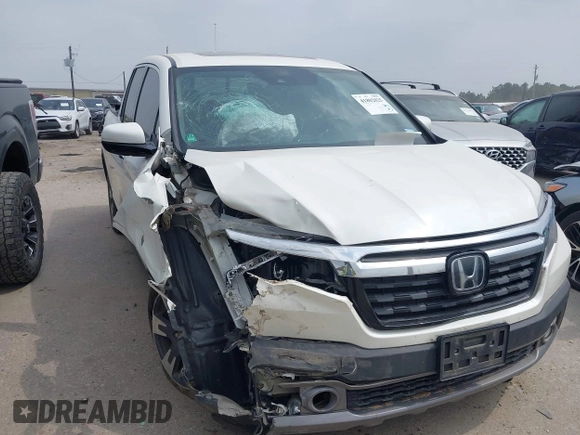 2018 Honda Ridgeline RTL-E with VIN 5FPYK3F77JB004379, listed as a IAAI auction lot 41802025 with 132,085 mi miles and . Bid and sale history available at DreamBid. Image 1.