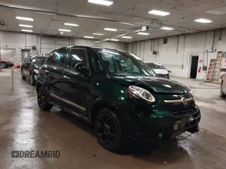 2015 FIAT 500L Urbana Trekking with VIN ZFBCFADHXFZ033922, listed as a IAAI auction lot 41650689 with 139,085 mi miles and . Bid and sale history available at DreamBid. Image 1.