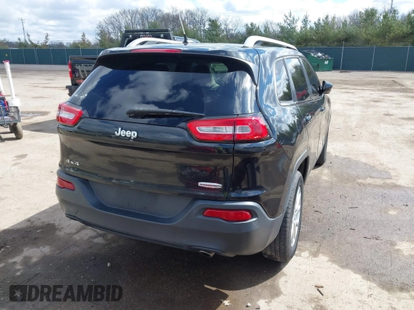 2014 Jeep Cherokee Latitude with VIN 1C4PJMCS6EW219999, listed as a IAAI auction lot 42044695 with 169,533 mi miles and . Bid and sale history available at carsss.com. Image 4.