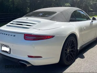 2014 Porsche 911 Carrera z VIN WP0CA2A92ES140453, wystawiony jako IAAI lot #42302853 z przebiegiem 47 879 mil mil oraz . Historia ofert i sprzedaży dostępna na DreamBid. Obrazek 4.