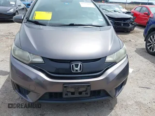2016 Honda Fit LX z VIN JHMGK5H59GX033309, wystawiony jako IAAI lot #42223281 z przebiegiem 114 605 mil mil oraz . Historia ofert i sprzedaży dostępna na DreamBid. Obrazek 12.