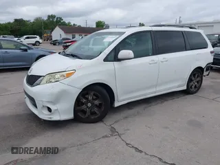 2011 Toyota Sienna SE with VIN 5TDXK3DC1BS069696, listed as a IAAI auction lot 41976857 with 160,994 mi miles. Bid and sale history available at carsss.com. Image 18.