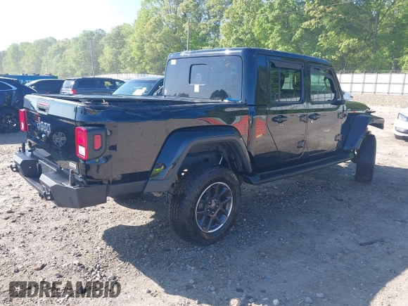 2023 Jeep Gladiator Overland z VIN 1C6HJTFG9PL549685, wystawiony jako IAAI lot #42037635 z przebiegiem 40 734 mil mil oraz . Historia ofert i sprzedaży dostępna na DreamBid. Obrazek 4.
