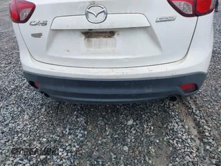 2015 Mazda CX-5 Touring with VIN JM3KE2CY4F0436664, listed as a IAAI auction lot 41876238 with 374,305 mi miles. Bid and sale history available at carsss.com. Image 20.