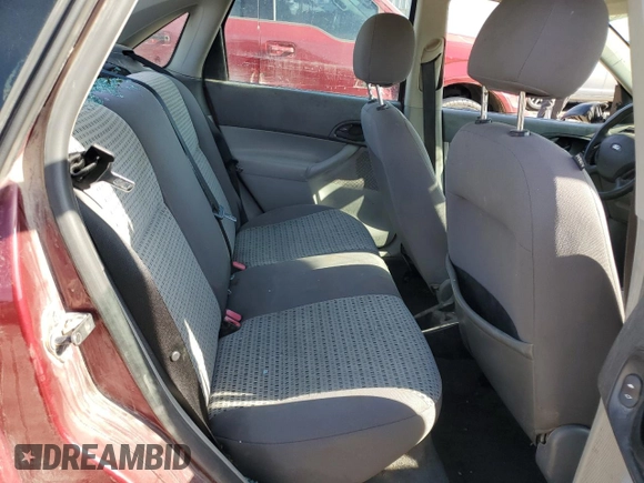 2006 Ford Focus S z VIN 1FAHP34N36W250236, wystawiony jako Copart lot #53794555 z przebiegiem 198 791 mil mil oraz Szkody całkowita. Historia ofert i sprzedaży dostępna na DreamBid. Obrazek 10.