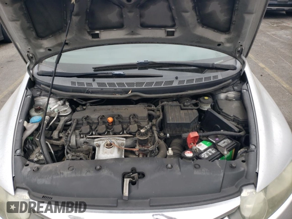 2010 Honda Civic z VIN 19XFA1E39AE028789, wystawiony jako Copart lot #71501844 z przebiegiem 136 429 mil mil oraz Szkoda całkowita • Salvage title. Historia ofert i sprzedaży dostępna na DreamBid. Obrazek 11.