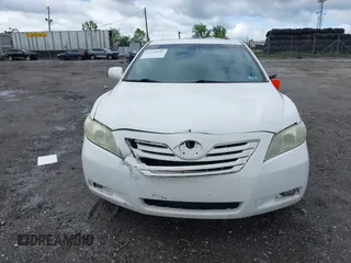 2009 Toyota Camry LE z VIN 4T1BK46K59U588966, wystawiony jako IAAI lot #42343044 z przebiegiem 157 284 mil mil oraz . Historia ofert i sprzedaży dostępna na DreamBid. Obrazek 11.