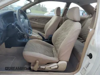 1997 Mitsubishi Mirage LS z VIN JA3AY31C1VU009019, wystawiony jako Copart lot #74227544 z przebiegiem 243 967 mil mil oraz Szkoda całkowita • Salvage title. Historia ofert i sprzedaży dostępna na DreamBid. Obrazek 7.