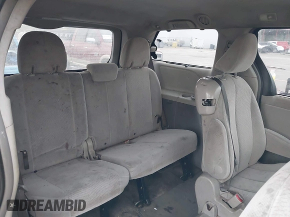 2014 Toyota Sienna LE AAS with VIN 5TDKK3DC8ES457023, listed as a IAAI auction lot 42067713 with 335,130 mi miles. Bid and sale history available at carsss.com. Image 8.
