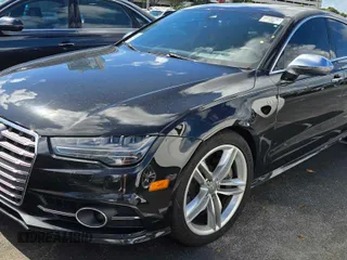 2016 Audi S7 with VIN WAUW2AFCXGN015062, listed as a Copart auction lot 80297524 with 73,930 mi miles and Clean Title. Bid and sale history available at carsss.com. Image 2.
