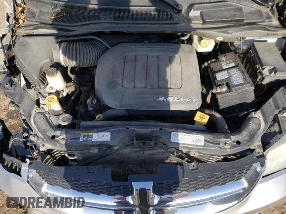 2014 Dodge Grand Caravan American Value with VIN 2C4RDGBG5ER185593, listed as a Copart auction lot 48768065 with 167,834 mi miles and Salvage Title. Bid and sale history available at DreamBid. Image 11.