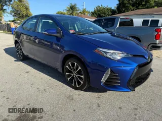 2019 Toyota Corolla L z VIN 2T1BURHE6KC173158, wystawiony jako Copart lot #58867495 z przebiegiem 99 954 mil mil oraz Czysty tytuł • Clean title. Historia ofert i sprzedaży dostępna na DreamBid. Obrazek 1.