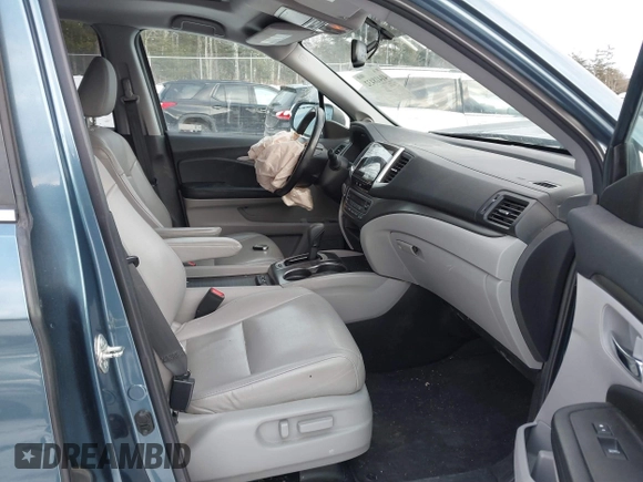 2018 Honda Pilot EX-L with VIN 5FNYF6H57JB007065, listed as a IAAI auction lot 41418432 with 123,806 mi miles. Bid and sale history available at carsss.com. Image 5.