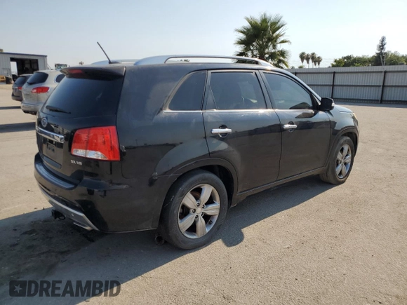 2012 Kia Sorento SX with VIN 5XYKW4A20CG297980, listed as a Copart auction lot 64844745 with 171,239 mi miles and Clean title. Bid and sale history available at DreamBid. Image 3.