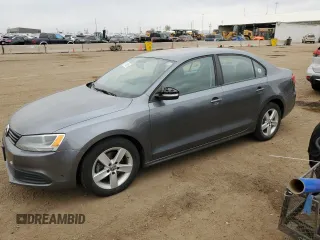 2012 Volkswagen Jetta TDI w/Premium с VIN 3VWLL7AJ7CM040711, выставлен на аукционе Copart как лот 51310265 с пробегом 245 720 миль миль и Чистый • Clean title. История ставок и продаж доступна на DreamBid. Изображение 1.