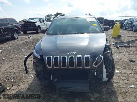 2016 Jeep Cherokee Latitude with VIN 1C4PJLCS1GW257539, listed as a IAAI auction lot 42445331 with 55,879 mi miles and . Bid and sale history available at DreamBid. Image 12.