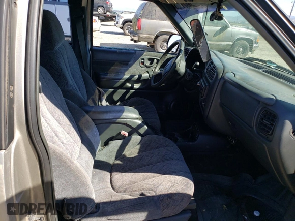 1999 GMC Sonoma SLS with VIN 1GTCS19X0X8530851, listed as a Copart auction lot 69718564 with 0 mi miles and Salvage Title. Bid and sale history available at carsss.com. Image 7.