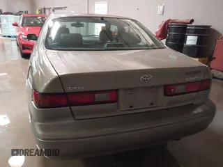 1999 Toyota Camry LE z VIN JT2BF28K7X0167855, wystawiony jako IAAI lot #41609230 z przebiegiem 242 398 mil mil oraz . Historia ofert i sprzedaży dostępna na DreamBid. Obrazek 16.