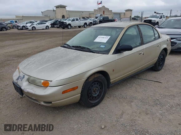 2002 Saturn SL z VIN 1G8ZK52732Z131361, wystawiony jako IAAI lot #42358215 z przebiegiem 228 184 mil mil oraz . Historia ofert i sprzedaży dostępna na DreamBid. Obrazek 2.