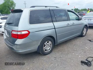 2007 Honda Odyssey EX-L with VIN 5FNRL38627B055862, listed as a IAAI auction lot 42148442 with 225,627 mi miles. Bid and sale history available at carsss.com. Image 4.