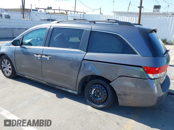 2014 Honda Odyssey EX-L with VIN 5FNRL5H66EB099792, listed as a IAAI auction lot 42160220 with 160,852 mi miles and . Bid and sale history available at carsss.com. Image 3.