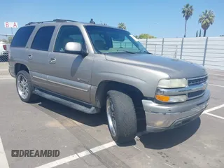 2003 Chevrolet Tahoe LS z VIN 1GNEC13T03R104147, wystawiony jako IAAI lot #42100263 z przebiegiem 188 249 mil mil oraz . Historia ofert i sprzedaży dostępna na DreamBid. Obrazek 1.