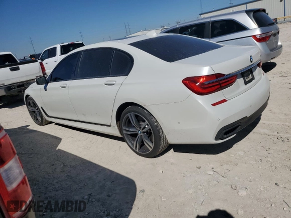 2019 BMW 7 Series 750i with VIN WBA7F0C5XKGM25348, listed as a Copart auction lot 46537485 with 54,365 mi miles and Salvage title. Bid and sale history available at DreamBid. Image 2.