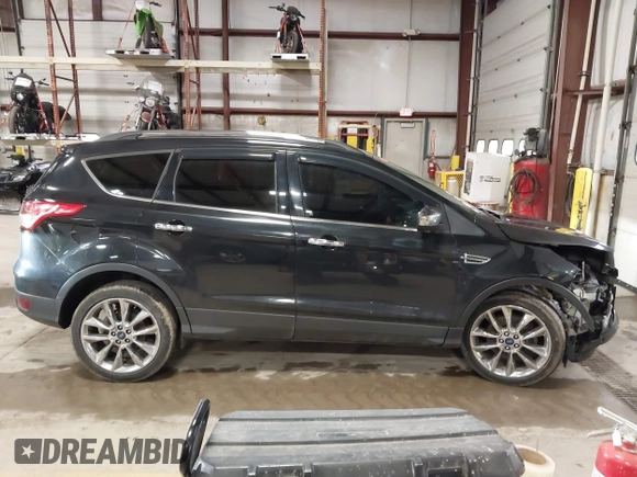 2015 Ford Escape SE with VIN 1FMCU9G9XFUA70029, listed as a IAAI auction lot 41673827 with 82,043 mi miles. Bid and sale history available at carsss.com. Image 14.